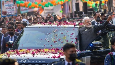 Prime Minister Narendra Modi waves at supporters during a roadshow, in New Delhi, Monday, Jan. 16, 2023. (PTI Photo/Ravi Choudhary) Prime Minister Narendra Modi waves at supporters during a roadshow, in New Delhi, Monday, Jan. 16, 2023. (PTI Photo/Ravi Choudhary)