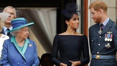 Prince Harry and Meghan Markle with late Queen Elizabeth II and Prince Andrew.