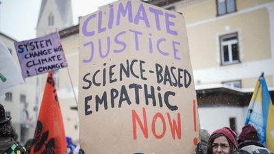 People attend a demostration demanding climate justice and against the annual meeting of the World Economic Forum in Davos, Switzerland Sunday. (AP) People attend a demostration demanding climate justice and against the annual meeting of the World Economic Forum in Davos, Switzerland Sunday. (AP)