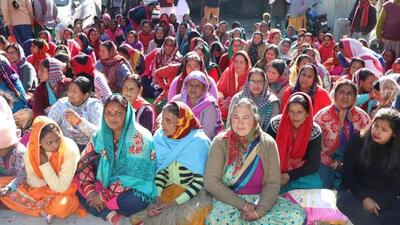 Women staged protest at the tehsil office in Joshimath on Monday (HT Photo/Rajeev Kala)