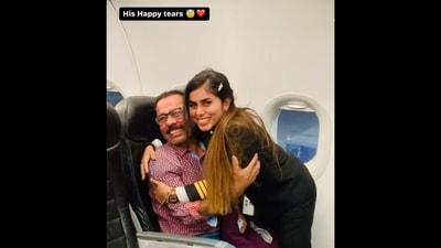 Capt. Krutadnya Hale gives her father a warm hug before touching his feet. (Instagram/@pilot_krutadnya) Capt. Krutadnya Hale gives her father a warm hug before touching his feet. (Instagram/@pilot_krutadnya)