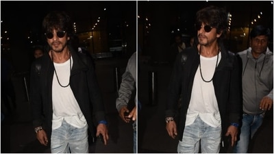 Shah Rukh Khan in a classic white tee and blue denim jeans at the airport. (HT Photo/Varinder Chawla) Shah Rukh Khan in a classic white tee and blue denim jeans at the airport. (HT Photo/Varinder Chawla)