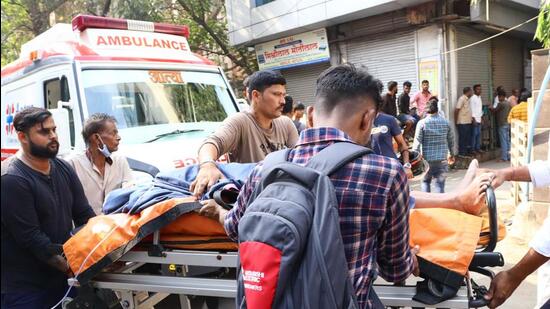 Mumbai, Dec 17 (ANI): A patient is being taken to a safer place after a fire broke out at Parakh Hospital, in the Ghatkopar area, in Mumbai on Saturday. (ANI Photo) (Deepak Salvi) Mumbai, Dec 17 (ANI): A patient is being taken to a safer place after a fire broke out at Parakh Hospital, in the Ghatkopar area, in Mumbai on Saturday. (ANI Photo) (Deepak Salvi)