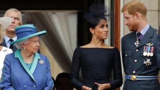 Prince Harry and Meghan Markle with late Queen Elizabeth II and Prince Andrew. 