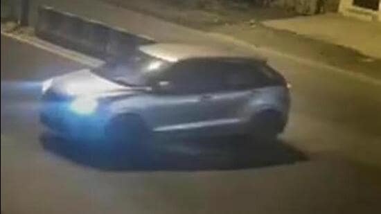 Video grab of a car that reportedly hit a woman and dragged her for kilometers, in the Sultanpuri area of the national Capital. (PTI photo)