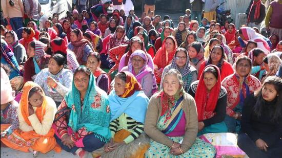 Women staged protest at the tehsil office in Joshimath on Monday (HT Photo/Rajeev Kala)
