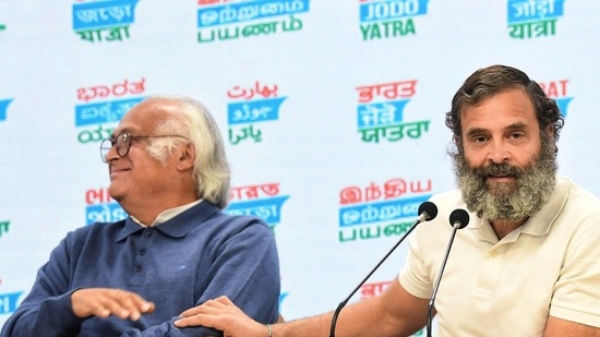 Congress leader Rahul Gandhi with party leader Jairam Ramesh addresses a press conference, at the party headquarters, in New Delhi on Saturday.