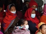 Family members of victims who died in the Yeti Airlines plane crash wait outside a hospital, in Pokhara on Tuesday. (AFP) Family members of victims who died in the Yeti Airlines plane crash wait outside a hospital, in Pokhara on Tuesday. (AFP)
