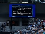 Australian Open 2023: Heat policy message is displayed on the big screen as play is suspended on the outside courts due to high temperatures.