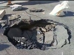A three feet wide sinkhole appeared in a freshly laid road in Bengaluru's Mahalakshmi Layout on Tuesday.(Mohammed Yacoob/Twitter) A three feet wide sinkhole appeared in a freshly laid road in Bengaluru's Mahalakshmi Layout on Tuesday.(Mohammed Yacoob/Twitter)