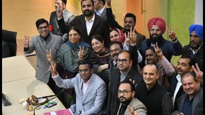 Anup Gupta (seated) with BJP MP Kirron Kher (third from left standing) and party councillors after he was elected Chandigarh’s new mayor in a close contest in which he defeated the AAP’s Jasbir Singh by one vote on Tuesday. (Keshav Singh/HT) Anup Gupta (seated) with BJP MP Kirron Kher (third from left standing) and party councillors after he was elected Chandigarh’s new mayor in a close contest in which he defeated the AAP’s Jasbir Singh by one vote on Tuesday. (Keshav Singh/HT)