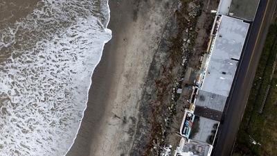 California Storm: Houses along Beach Dr. in Seacliff that were damaged by flooding are seen. (Reuters)