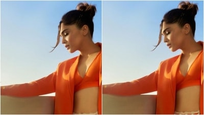 Sharvari's showstopper look came with a hot orange bikini, an orange blazer and a perforated white cut-out netted skirt layered on her ensemble. (Instagram/@sharvari) Sharvari's showstopper look came with a hot orange bikini, an orange blazer and a perforated white cut-out netted skirt layered on her ensemble. (Instagram/@sharvari)