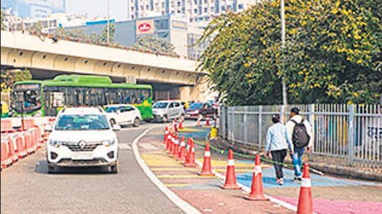 The ongoing tactical urbanism experiment at Nehru Place. Temporary features were added to make the intersection safer for pedestrians. (HT Photo) The ongoing tactical urbanism experiment at Nehru Place. Temporary features were added to make the intersection safer for pedestrians. (HT Photo)