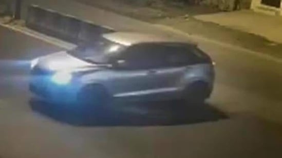 Video grab of a car that reportedly hit a woman and dragged her for kilometers, in the Sultanpuri area of the national Capital. (PTI photo)