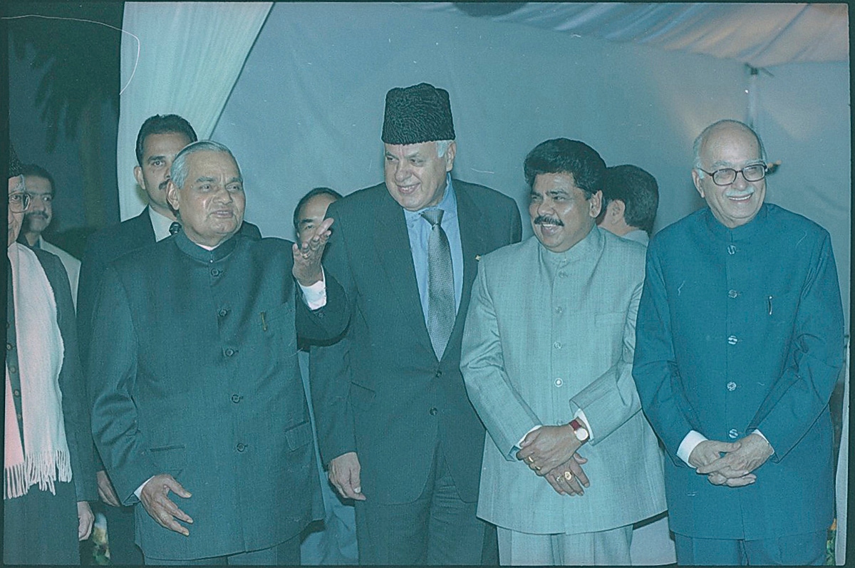 Farooq Abdullah with Prime Minister AB Vajpayee(L) and LK Advani (extreme right) at an iftar party on 5 December 2001. (Arvind Yadav/HT Photo) Farooq Abdullah with Prime Minister AB Vajpayee(L) and LK Advani (extreme right) at an iftar party on 5 December 2001. (Arvind Yadav/HT Photo)
