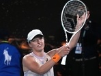 Iga Swiatek of Poland celebrates after defeating Camila Osorio of Colombia in their second round match at the Australian Open tennis championship in Melbourne, Australia, Wednesday, Jan. 18, 2023. (AP Photo/Dita Alangkara)(AP) Iga Swiatek of Poland celebrates after defeating Camila Osorio of Colombia in their second round match at the Australian Open tennis championship in Melbourne, Australia, Wednesday, Jan. 18, 2023. (AP Photo/Dita Alangkara)(AP)