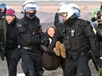 Greta Thunberg Germany Protests: Police officers carry Swedish climate activist Greta Thunberg.(AFP) Greta Thunberg Germany Protests: Police officers carry Swedish climate activist Greta Thunberg.(AFP)
