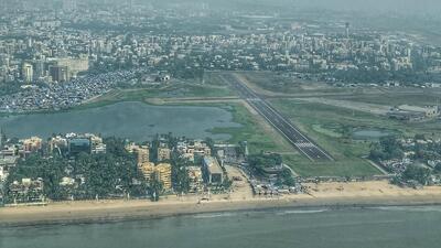 State seeks Centre nod for slum rehabilitation near Juhu airport State seeks Centre nod for slum rehabilitation near Juhu airport