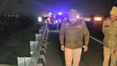 A police officer looks at the carcass of the leopard on the Delhi-Meerut Expressway in Ghaziabad on Tuesday. (PTI) A police officer looks at the carcass of the leopard on the Delhi-Meerut Expressway in Ghaziabad on Tuesday. (PTI)