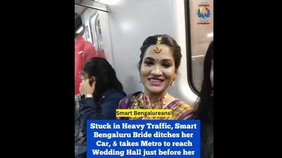 A bride stuck in heavy traffic ditched her car and took a metro to her wedding hall. (@ForeverBLRU/Twitter) A bride stuck in heavy traffic ditched her car and took a metro to her wedding hall. (@ForeverBLRU/Twitter)