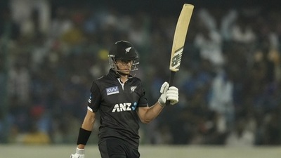 Mitchell Santner celebrates scoring fifty runs during the first ODI between India and New Zealand in Hyderabad (AP) Mitchell Santner celebrates scoring fifty runs during the first ODI between India and New Zealand in Hyderabad (AP)