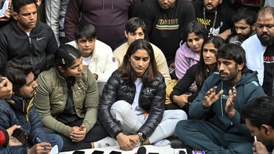 Indian wrestler Vinesh Phogat with wrestler Sakshi Malik, Bajrang Punia and others react during a press conference regarding wrestlers' protest against the Wrestling Federation of India, at Jantar Mantar in New Delhi. (Raj K Raj/HT) Indian wrestler Vinesh Phogat with wrestler Sakshi Malik, Bajrang Punia and others react during a press conference regarding wrestlers' protest against the Wrestling Federation of India, at Jantar Mantar in New Delhi. (Raj K Raj/HT)