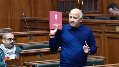 Manish Sisodia, holding a copy of the Constitution, said that if people believe in the Constitution, then they will have to agree that the municipal bodies and their matters are dealt by the state government, not by the Centre. (HT Photo) Manish Sisodia, holding a copy of the Constitution, said that if people believe in the Constitution, then they will have to agree that the municipal bodies and their matters are dealt by the state government, not by the Centre. (HT Photo)