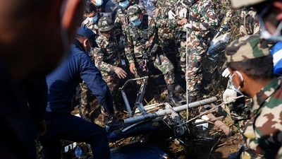 Nepal Plane Crash: Rescue teams from Nepal Army and Police work to retrieve bodies at the crash site. (Reuters)