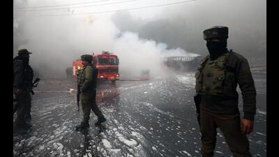 Security personnel stand guard at the site where an encounter took place between security forces and terrorists, at Sidhra, in Jammu on December 28, 2022. (ANI)