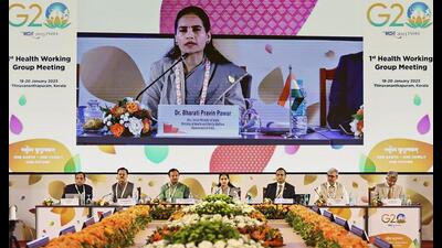 Union MoS for health and family welfare Bharati Pawar addresses the 1st Health Working Group meeting under G20 India presidency, in Thiruvananthapuram, Wednesday. Union minister for parliamentary affairs V. Muraleedharan is also seen. (PTI Photo) Union MoS for health and family welfare Bharati Pawar addresses the 1st Health Working Group meeting under G20 India presidency, in Thiruvananthapuram, Wednesday. Union minister for parliamentary affairs V. Muraleedharan is also seen. (PTI Photo)