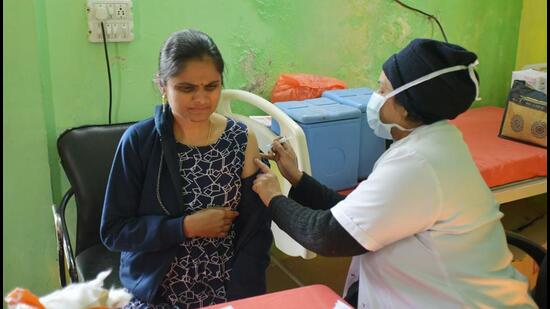 Covid-19 vaccine is administered at the Combined District Hospital in Sanjay Nagar, Sector 23 in Ghaziabad on Wednesday. (Sakib Ali/HT Photo)