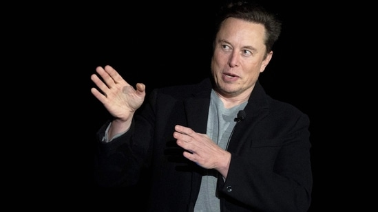 Elon Musk Twitter: Elon Musk gestures as he speaks during a press conference.(AFP)