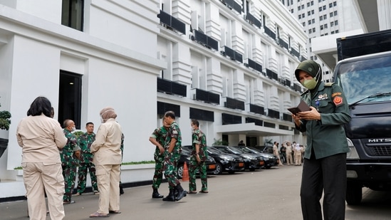 Indonesia Earthquake: People gather outside the Indonesia's Defense Ministry buildings following an earthquake in Jakarta, Indonesia.(Reuters)