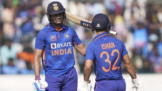 Shubhman Gill celebrates with batting partner Ishan Kishan after scoring fifty runs (AP)