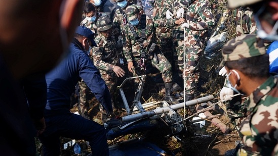 Nepal Plane Crash: Rescue teams from Nepal Army and Police work to retrieve bodies at the crash site.(Reuters)