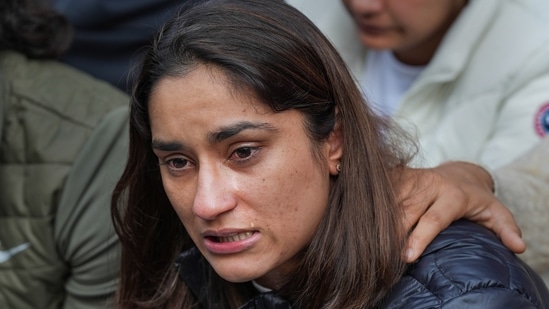 Indian wrestler Vinesh Phogat reacts during a press conference regarding wrestlers' protest against the Wrestling Federation of India (WFI), in New Delhi(PTI)