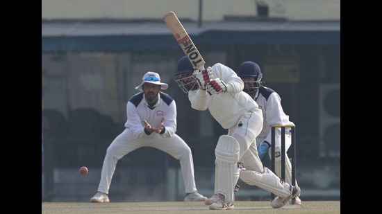 Players in action during the match between Punjab and Madhya Pradesh at IS Bindra PCA Stadium in Mohali on Wednesday. (Keshav Singh/HT)