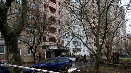 Dead bodies lay on the ground at the scene where a helicopter crashed on civil infrastructure in Brovary.(REUTERS)