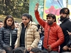 Wrestlers Vinesh Phogat, Sakshee Malikkh, Bajrang Punia, and others during a silent protest for the second day against the Wrestling Federation of India (WFI) and its chief Brij Bhushan Sharan Singh at Jantar Mantar, in Delhi on Thursday. (ANI Photo) Wrestlers Vinesh Phogat, Sakshee Malikkh, Bajrang Punia, and others during a silent protest for the second day against the Wrestling Federation of India (WFI) and its chief Brij Bhushan Sharan Singh at Jantar Mantar, in Delhi on Thursday. (ANI Photo)