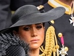 Meghan Markle: Meghan, Duchess of Sussex watches as the coffin of Queen Elizabeth II is placed into the hearse.(AP) Meghan Markle: Meghan, Duchess of Sussex watches as the coffin of Queen Elizabeth II is placed into the hearse.(AP)