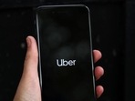 Uber's logo is displayed on a mobile phone in London(REUTERS) Uber's logo is displayed on a mobile phone in London(REUTERS)