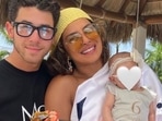 Priyanka Chopra and Nick Jonas with Malti Marie Chopra Jonas. Priyanka Chopra and Nick Jonas with Malti Marie Chopra Jonas.