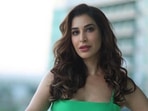 Sophie Choudry reacts to troll about her accent.