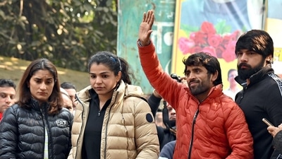 Wrestlers Vinesh Phogat, Sakshee Malikkh, Bajrang Punia, and others during a silent protest for the second day against the Wrestling Federation of India (WFI) and its chief Brij Bhushan Sharan Singh at Jantar Mantar, in Delhi on Thursday. (ANI Photo) Wrestlers Vinesh Phogat, Sakshee Malikkh, Bajrang Punia, and others during a silent protest for the second day against the Wrestling Federation of India (WFI) and its chief Brij Bhushan Sharan Singh at Jantar Mantar, in Delhi on Thursday. (ANI Photo)