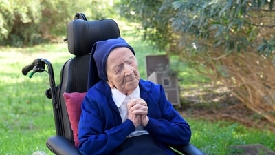 Sister Andre, Lucile Randon in the registry of birth, the eldest French and European citizen, prays in a wheelchair, on the eve of her 117th birthday.