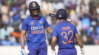 India's Shubhman Gill, left, celebrates with batting partner Ishan Kishan after scoring fifty runs (AP) India's Shubhman Gill, left, celebrates with batting partner Ishan Kishan after scoring fifty runs (AP)