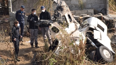 Nepal Plane Crash: A French investigating team investigates the wreckage of a Yeti Airlines. (Reuters)