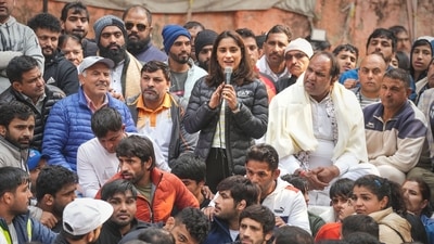Wrestler Vinesh Phogat speaks during a 'dharna' to protest against the Wrestling Federation of India (WFI), at Jantar Mantar in Delhi, Thursday. (PTI) Wrestler Vinesh Phogat speaks during a 'dharna' to protest against the Wrestling Federation of India (WFI), at Jantar Mantar in Delhi, Thursday. (PTI)