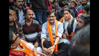 Shiv Sena (Uddhav Balasaheb Thackeray) leader Sanjay Raut joins Kashmiri Pandits during their protest demanding their safe relocation from Kashmir in Jammu Thursday. (PTI)
